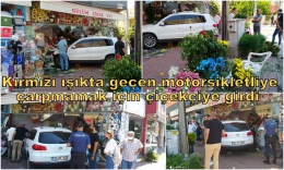 Kırmızı ışıkta geçen motorsiklete çarpmamak için çiçekçi dükkanına girdi
